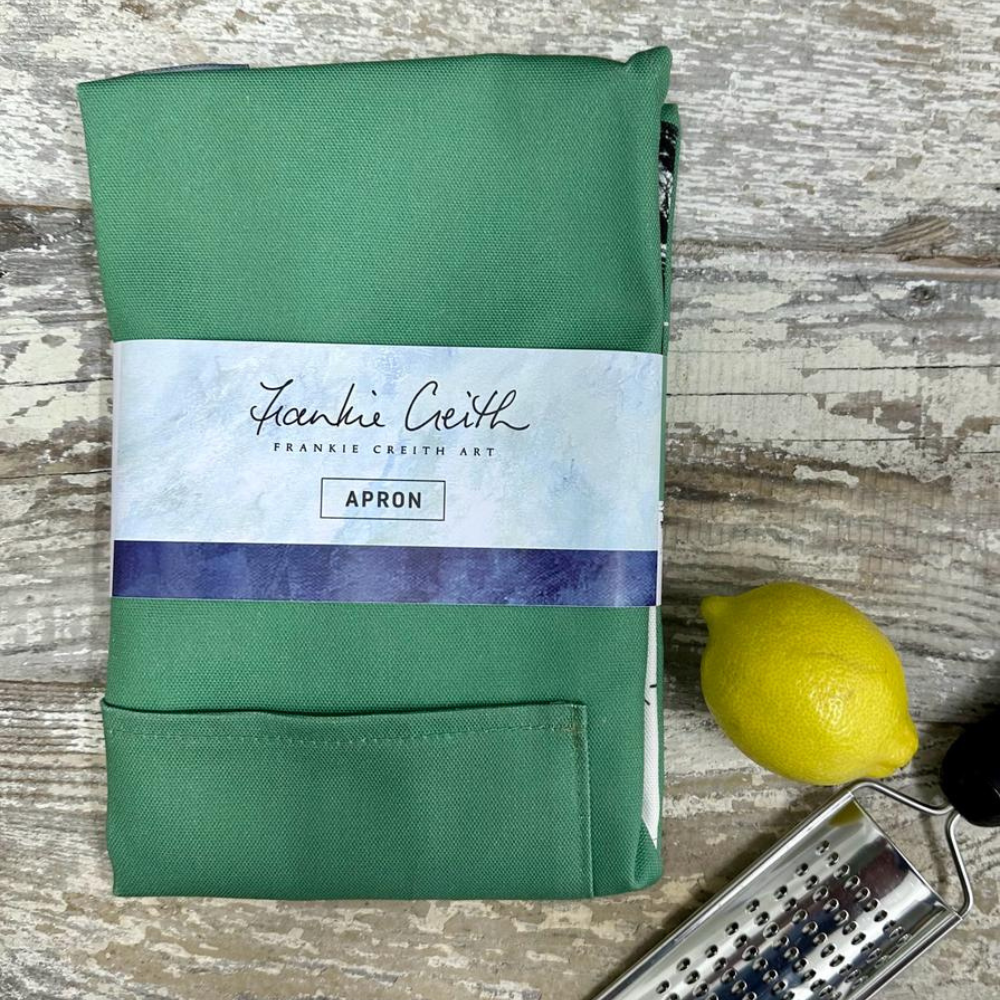 Dunluce Castle Apron by Frankie Creith in sleeve packaging