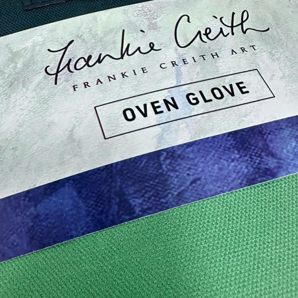 Dunluce Castle Oven Glove by Frankie Creith with sleeve