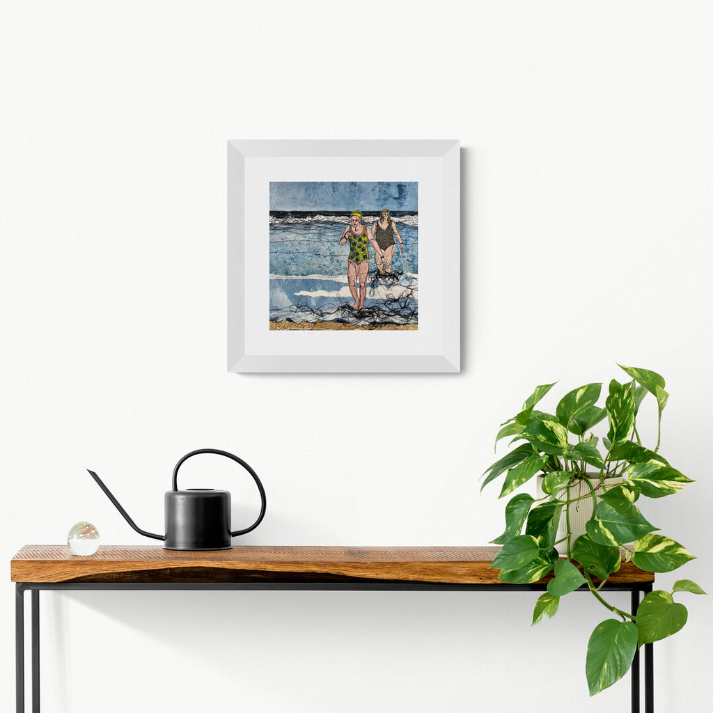 Sea Swimmers One original artwork hanging on a wall