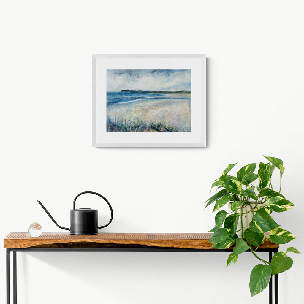 Ballycastle Beach print by Frankie Creith hanging on a wall.