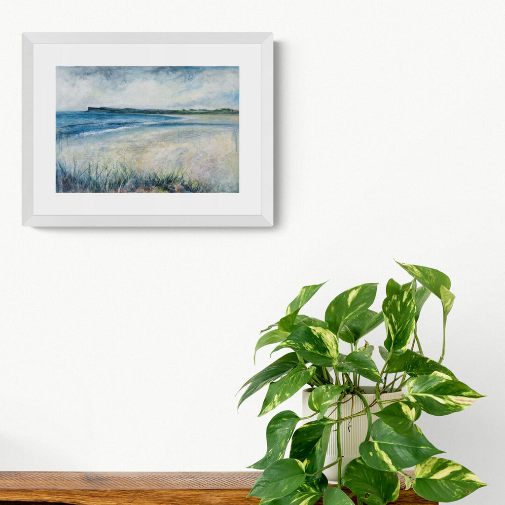 Ballycastle Beach print by Frankie Creith hanging on a wall.